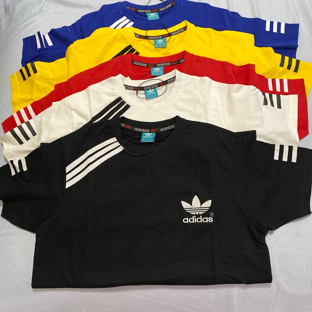 RARE ADIDAS..PUMA AND CHAMPION SHIRTS $30 FIRM OR 3 OR MORE FOR $25 APIECE